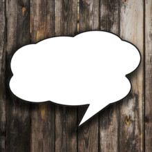 speech bubbles on wooden background